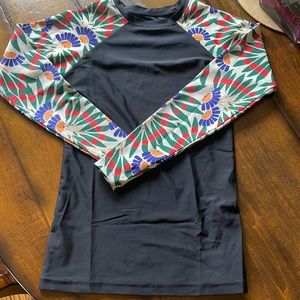 Women’s Black Rash Guard Swim Top with Floral Print Sleeves